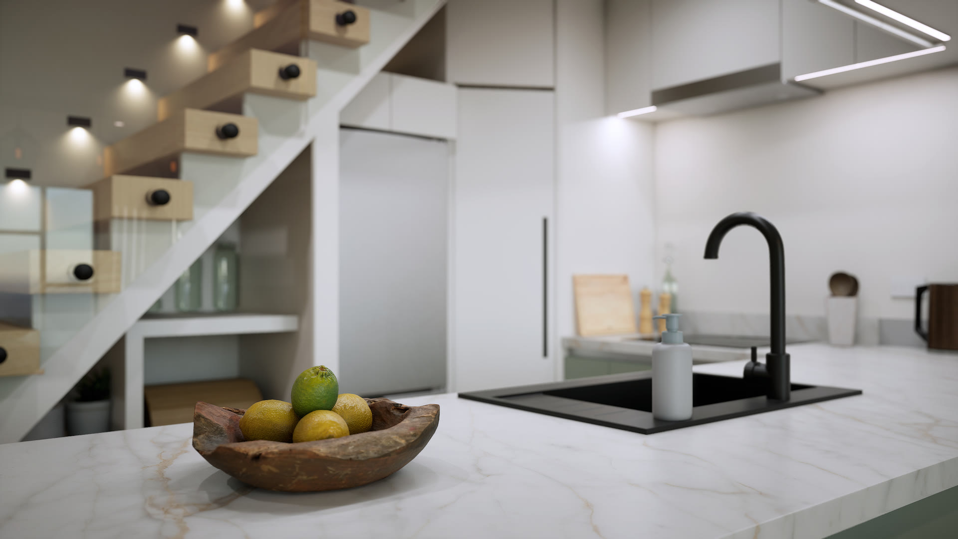 A wooden bowl of citrus on the marble island top, with the black sink and the stair soft in the background