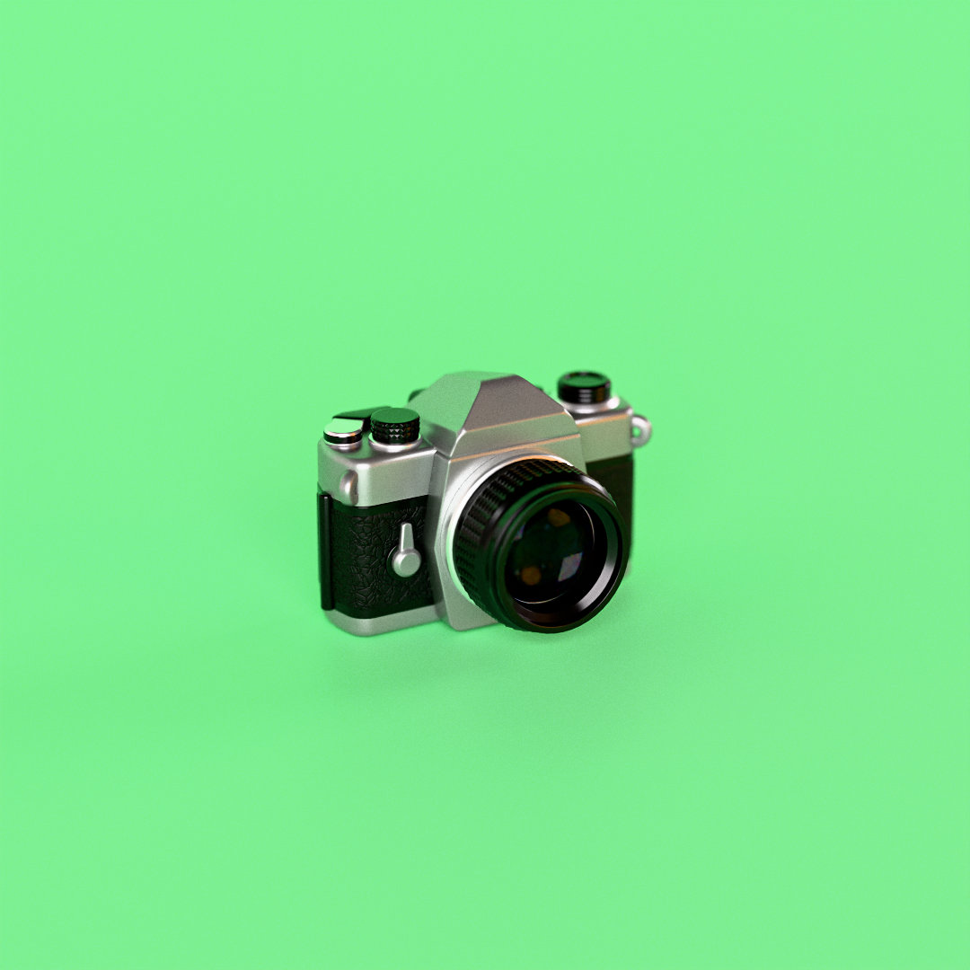 The SLR: chrome top plate, black leatherette body, prism hump and a knurled lens